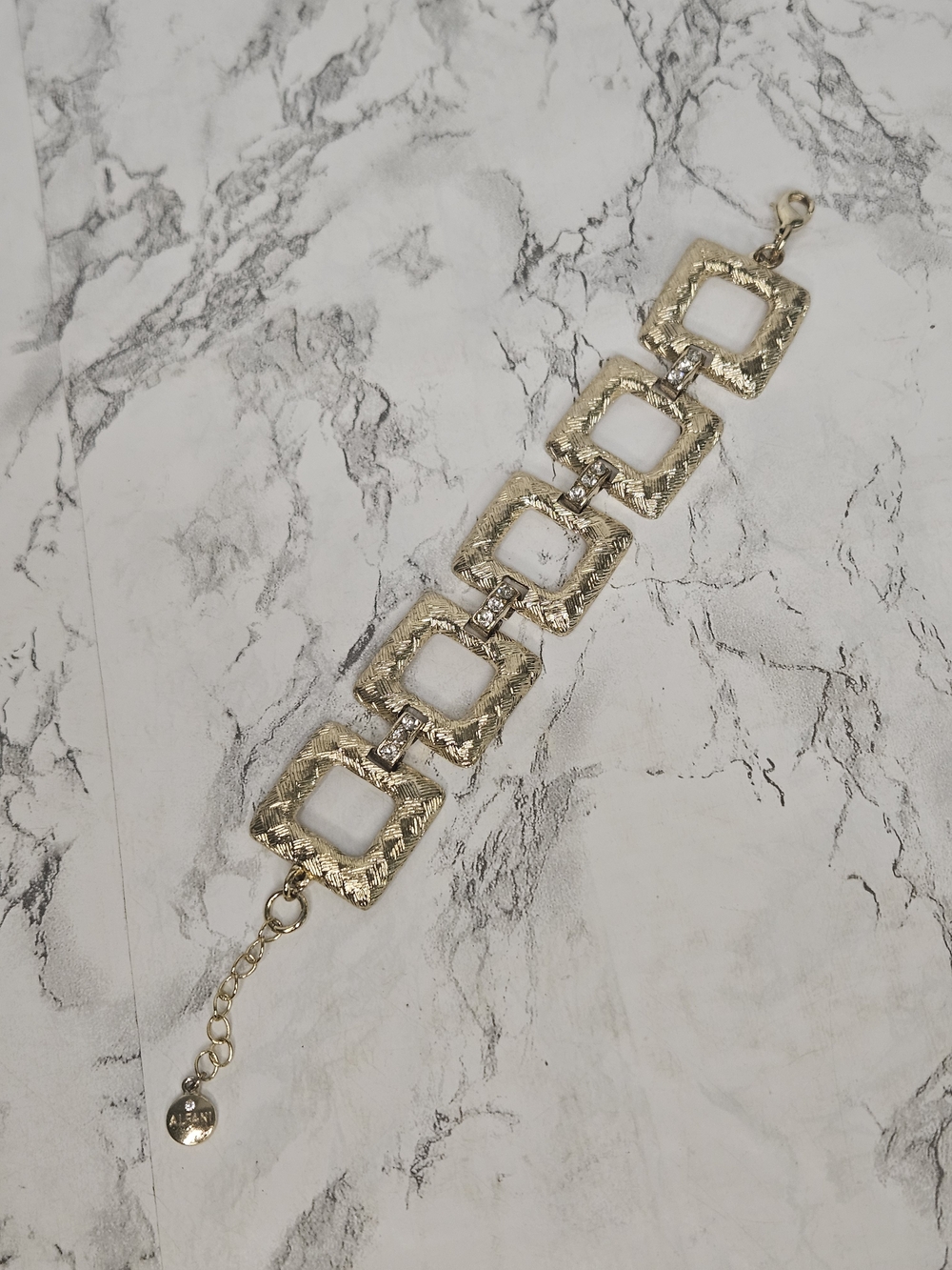 vintage Alfani gold-tone metal bracelet features brushed squares